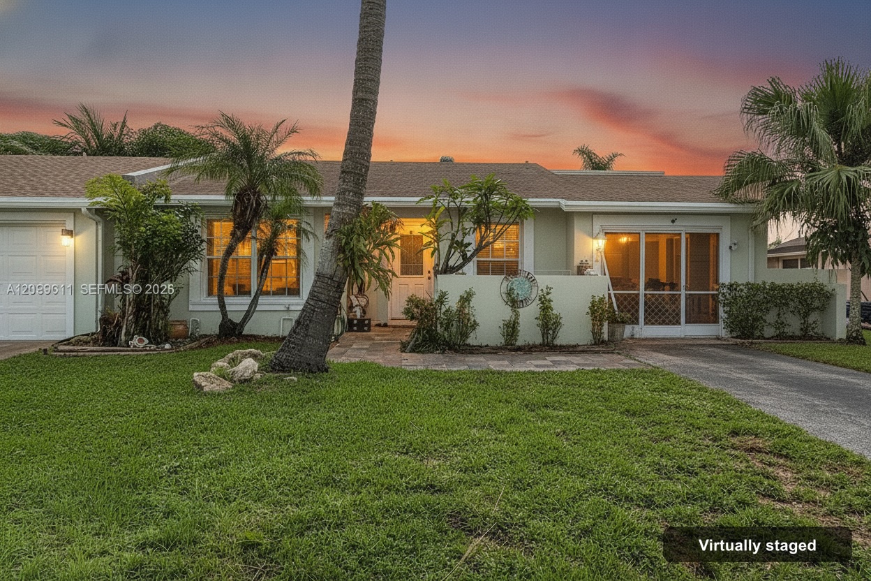Same house exterior enhanced with a twilight sky, warm window glow, and green lawn